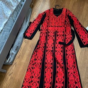 Thobe with built in belt.